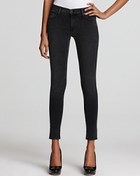 Fashioned in a rich charcoal wash, these James Jeans skinny jeans are an ultra-cool twist on ubiquitous blue denim. Fashioned in a rich charcoal wash, these James Jeans skinny jeans are an ultra-cool twist on ubiquitous blue denim.