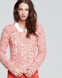 Add a dose of color to your chilly-season wardrobe with this Free People sweater, rendered in a classic cable knit. Add a dose of color to your chilly-season wardrobe with this Free People sweater, rendered in a classic cable knit.