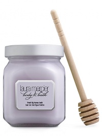 Discover a new twist on luxury with Laura Mercier's Honey Bath. Twirl the Fresh Fig emulsion into your bath and watch it transform into a decadent foaming experience. The thick, rich bubbles leave your skin supple and your senses calm and relaxed, while Shea Butter, Macadamia Nut Oil derivatives and Fig Extracts leave skin velvety soft. Hydrolyzed Rice, Sweet Almond and Oat Proteins along with Pro-Vitamin B-5 offer skin moisture balance and protection. Discover a new twist on luxury with Laura Mercier's Honey Bath. Twirl the Fresh Fig emulsion into your bath and watch it transform into a decadent foaming experience. The thick, rich bubbles leave your skin supple and your senses calm and relaxed, while Shea Butter, Macadamia Nut Oil derivatives and Fig Extracts leave skin velvety soft. Hydrolyzed Rice, Sweet Almond and Oat Proteins along with Pro-Vitamin B-5 offer skin moisture balance and protection.