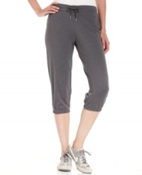 Make your workout a little more chic in Nike's capri sweat pants, featuring a comfy pull-on design and elastic hems for a perfect fit. Make your workout a little more chic in Nike's capri sweat pants, featuring a comfy pull-on design and elastic hems for a perfect fit.