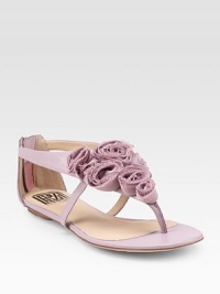 THE LOOKThong sandal with chiffon rosettes Back zipperTHE FITStacked heel, ¼ (5mm)THE MATERIALLeather upper Leather lining and sole Padded insoleORIGINImported THE LOOKThong sandal with chiffon rosettes Back zipperTHE FITStacked heel, ¼ (5mm)THE MATERIALLeather upper Leather lining and sole Padded insoleORIGINImported