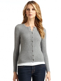 THE LOOKLuxe 2-ply cashmere from expertly maintained inner Mongolian cashmere goatsFeatures long, fine, smooth fibers top-dyed for maximum color saturationRibbed roundneckLong ribbed cuff sleevesFront button closureTHE FITAbout 24 from shoulder to hemTHE MATERIALCashmereCARE & ORIGINDry cleanImportedModel shown is 5'9½ (176cm) wearing US size Small. This item was originally available for purchase at Saks Fifth Avenue OFF 5TH stores. THE LOOKLuxe 2-ply cashmere from expertly maintained inner Mongolian cashmere goatsFeatures long, fine, smooth fibers top-dyed for maximum color saturationRibbed roundneckLong ribbed cuff sleevesFront button closureTHE FITAbout 24 from shoulder to hemTHE MATERIALCashmereCARE & ORIGINDry cleanImportedModel shown is 5'9½ (176cm) wearing US size Small. This item was originally available for purchase at Saks Fifth Avenue OFF 5TH stores.