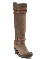 Slim leather straps wrap Frye's soft suede boots. Pair with calf-grazing dresses in autumn's lush silks. Slim leather straps wrap Frye's soft suede boots. Pair with calf-grazing dresses in autumn's lush silks.