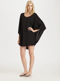 A feminine round neckline, well-placed seams and flirty ruffle details complement the relaxed fit of this design.Stylized round neckDolman sleevesPull-on styleRuffle detailsRayonHand washImported A feminine round neckline, well-placed seams and flirty ruffle details complement the relaxed fit of this design.Stylized round neckDolman sleevesPull-on styleRuffle detailsRayonHand washImported