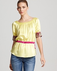 Bead and pearl embellished cuffs lend an opulent flair to this jewel-tone top from Aysha Collection. Bead and pearl embellished cuffs lend an opulent flair to this jewel-tone top from Aysha Collection.