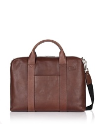 Sleek briefcase with top handles and zipper. Exterior slip pockets. Signature logo, adjustable optional strap. Interior pockets for organization. Clean with damp cloth. Sleek briefcase with top handles and zipper. Exterior slip pockets. Signature logo, adjustable optional strap. Interior pockets for organization. Clean with damp cloth.