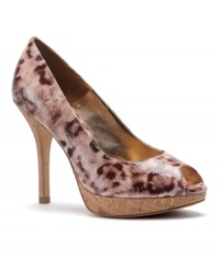 A toast to the season's most fetching shoes. The Notte platform pumps by Isola shine in patent leather with a dainty peep toe. A toast to the season's most fetching shoes. The Notte platform pumps by Isola shine in patent leather with a dainty peep toe.