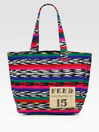 Vibrant and colorful, this eye-catching cotton tote will add cultural flair to any look. Each FEED Guatemala Bag is handcrafted with traditional Ikat fabrics and provides 15 school meals. Double top handles, 9½ dropOpen topOne inside open pocketOrganic cotton and natural burlap lining12W X 12H X 5DImported Vibrant and colorful, this eye-catching cotton tote will add cultural flair to any look. Each FEED Guatemala Bag is handcrafted with traditional Ikat fabrics and provides 15 school meals. Double top handles, 9½ dropOpen topOne inside open pocketOrganic cotton and natural burlap lining12W X 12H X 5DImported
