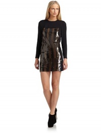 THE LOOKTonal sequins in frontLong sleevesBack zip closureTHE FITAbout 30 from shoulder to hemTHE MATERIALPolyesterFully linedCARE & ORIGINMachine washImportedModel shown is 5'10½ (179cm) wearing US size 4. THE LOOKTonal sequins in frontLong sleevesBack zip closureTHE FITAbout 30 from shoulder to hemTHE MATERIALPolyesterFully linedCARE & ORIGINMachine washImportedModel shown is 5'10½ (179cm) wearing US size 4.