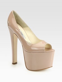 Ultra-high heel and platform delivered in glossy patent leather. Self-covered heel, 6½ (155mm)Covered platform, 3 (75mm)Compares to a 3½ heel (90mm)Patent leather upperLeather lining and solePadded insoleMade in ItalyOUR FIT MODEL RECOMMENDS ordering one half size up as this style runs small. Ultra-high heel and platform delivered in glossy patent leather. Self-covered heel, 6½ (155mm)Covered platform, 3 (75mm)Compares to a 3½ heel (90mm)Patent leather upperLeather lining and solePadded insoleMade in ItalyOUR FIT MODEL RECOMMENDS ordering one half size up as this style runs small.