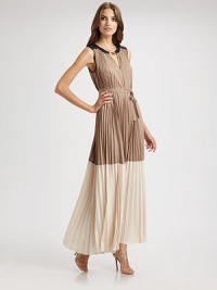 Crisp pleats and a glamorous chain neckline detail dress up this colorblock style.Jewel neckline with chain detailSleevelessBodice cutoutSelf sash beltBack buttonsAbout 43 from natural waistPolyesterDry cleanImportedModel shown is 5'11 (180cm) wearing US size Small. Crisp pleats and a glamorous chain neckline detail dress up this colorblock style.Jewel neckline with chain detailSleevelessBodice cutoutSelf sash beltBack buttonsAbout 43 from natural waistPolyesterDry cleanImportedModel shown is 5'11 (180cm) wearing US size Small.
