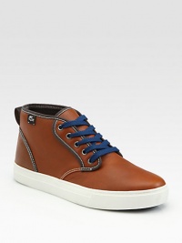 Refreshingly modern look fashioned with contrast stitching and laces with signature croc logo on side panel.Leather upperPadded insoleRubber soleImported Refreshingly modern look fashioned with contrast stitching and laces with signature croc logo on side panel.Leather upperPadded insoleRubber soleImported