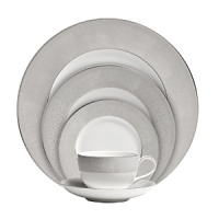 A muted taupe linen print background is accented with glittering stardust dots in this shimmering elegant china. A muted taupe linen print background is accented with glittering stardust dots in this shimmering elegant china.