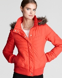 Bring bold color to winter days with this vibrant Volcom bomber jacket. Mitten-shaped pockets lend a playful finish. Bring bold color to winter days with this vibrant Volcom bomber jacket. Mitten-shaped pockets lend a playful finish.