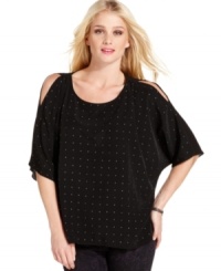 Show a little shoulder in this Calvin Klein Jeans top, complete with edgy studs and cut-outs at the shoulders. Show a little shoulder in this Calvin Klein Jeans top, complete with edgy studs and cut-outs at the shoulders.