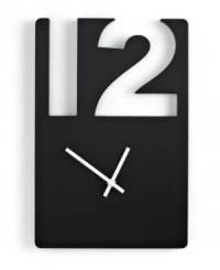 Cut to noon or midnight with this stylish Umbra wall clock. A minimalist dial and black and white scheme present the time of day with chic minimalism. Cut to noon or midnight with this stylish Umbra wall clock. A minimalist dial and black and white scheme present the time of day with chic minimalism.