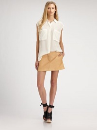 Semi-sheer, menswear-inspired silk top with slightly distressed armholes and two oversized patch pockets. Point collarSleevelessLonger length hits below the hipsSilkDry cleanImportedModel shown is 5'10 (177cm) wearing US size 4. Semi-sheer, menswear-inspired silk top with slightly distressed armholes and two oversized patch pockets. Point collarSleevelessLonger length hits below the hipsSilkDry cleanImportedModel shown is 5'10 (177cm) wearing US size 4.