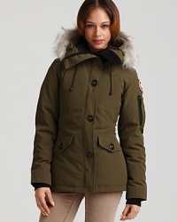 Canada Goose's below-the-knee length jacket boasts an adjustable down hood with luxe fleece lining and a removable Coyote fur ruff for versatility. Canada Goose's below-the-knee length jacket boasts an adjustable down hood with luxe fleece lining and a removable Coyote fur ruff for versatility.