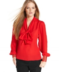 Inspired by the runway, Vince Camuto combines a ladylike bow blouse with edgy studded cuffs for a unique take on a classic look. Inspired by the runway, Vince Camuto combines a ladylike bow blouse with edgy studded cuffs for a unique take on a classic look.