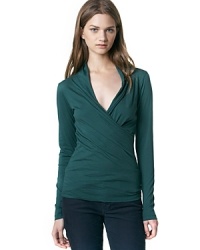 An alluring top in a flattering stretch fabric that features a greek goddess-inspired neckline we love. An alluring top in a flattering stretch fabric that features a greek goddess-inspired neckline we love.