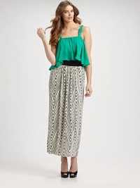 A silky draped woven top joins a zigzag print knit skirt in a dress that's fun, flirty and elegant. Square necklineShirred flat strapsDraped ruffled bodice, longer at sidesWide, elasticized solid waistbandLong print skirt, softly gatheredPullover stylingAbout 38½ from natural waistTop: viscoseSkirt: 94% polyester/6% spandexDry cleanMade in USA A silky draped woven top joins a zigzag print knit skirt in a dress that's fun, flirty and elegant. Square necklineShirred flat strapsDraped ruffled bodice, longer at sidesWide, elasticized solid waistbandLong print skirt, softly gatheredPullover stylingAbout 38½ from natural waistTop: viscoseSkirt: 94% polyester/6% spandexDry cleanMade in USA
