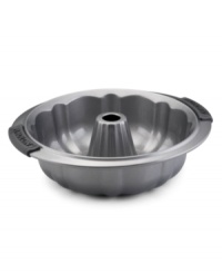 Beautify your bundts with the Anolon 9.5 fluted mold pan! New proprietary coating ensures superior release and makes cleanup a snap. Silicon-enhanced handles are steady and slip-free, while the pan's substantial weight provides durability and helps prevent warping. Lifetime limited warranty. Beautify your bundts with the Anolon 9.5 fluted mold pan! New proprietary coating ensures superior release and makes cleanup a snap. Silicon-enhanced handles are steady and slip-free, while the pan's substantial weight provides durability and helps prevent warping. Lifetime limited warranty.