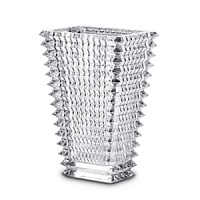 Designed by Nicolas Triboulot for Baccarat, this sparkling crystal vase features extraordinary craftsmanship-horizontal bevel cuts on the outside and vertical bevel cuts on the inside-for in a dazzling refractive effect. Designed by Nicolas Triboulot for Baccarat, this sparkling crystal vase features extraordinary craftsmanship-horizontal bevel cuts on the outside and vertical bevel cuts on the inside-for in a dazzling refractive effect.