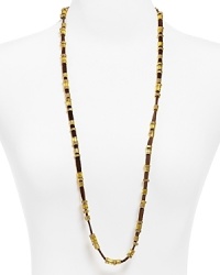 A leather cord and boldly hued beads are in harmony on this beaded wrap necklace from Vanessa Mooney. A leather cord and boldly hued beads are in harmony on this beaded wrap necklace from Vanessa Mooney.