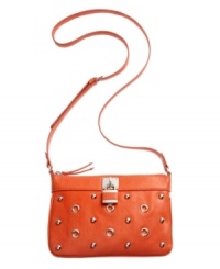 Absolutely delicious. This eye-catching crossbody from Nine West in an assortment of scrumptious colors is the perfect complement to your summer wardrobe. Polished silver-tone ball and circle design adorn the front with a sweet signature lock, for an altogether carefree style you'll love. Absolutely delicious. This eye-catching crossbody from Nine West in an assortment of scrumptious colors is the perfect complement to your summer wardrobe. Polished silver-tone ball and circle design adorn the front with a sweet signature lock, for an altogether carefree style you'll love.