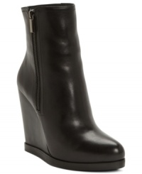 Strut your stuff. Sleek leather and a sultry wedge make the Sterlin booties by Truth or Dare by Madonna a must-have addition to your collection. Strut your stuff. Sleek leather and a sultry wedge make the Sterlin booties by Truth or Dare by Madonna a must-have addition to your collection.