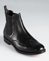 Channel menswear styling with Max Mara's Piroghe booties--pair this sleek leather silhouette with skinny black pants and an oversized cotton blouse. Channel menswear styling with Max Mara's Piroghe booties--pair this sleek leather silhouette with skinny black pants and an oversized cotton blouse.
