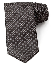 Bring your look into sharp focus with a rich Italian silk tie from Canali, delicately patterned for a unique addition to your workweek wardrobe. Bring your look into sharp focus with a rich Italian silk tie from Canali, delicately patterned for a unique addition to your workweek wardrobe.