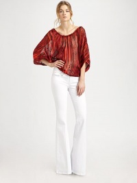 Burnout silk viscose crafted in an airy blouson silhouette with shapely drawstring waist.Drawstring baotneckGathered sleevesElastic drawstring waistAbout 25 from shoulder to hem55% silk/45% rayonDry cleanImportedModel shown is 5'10 (177cm) wearing US size 4. Burnout silk viscose crafted in an airy blouson silhouette with shapely drawstring waist.Drawstring baotneckGathered sleevesElastic drawstring waistAbout 25 from shoulder to hem55% silk/45% rayonDry cleanImportedModel shown is 5'10 (177cm) wearing US size 4.