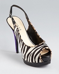 Black and white and striped all over, these GUESS pumps go forth in zebra print satin, leopard print trim, and a standout purple heel. Black and white and striped all over, these GUESS pumps go forth in zebra print satin, leopard print trim, and a standout purple heel.