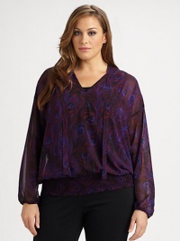 An exquisite print meets ethereal fabrication to create a breezy top with a feminine self-tie detail. Its smocked hem ensures this top offers a flattering and comfortable fit.Tie detail at v-neckDolman sleevesElasticized cuffsAllover printSmocked hemAbout 28 from shoulder to hemPolyesterMachine washImported An exquisite print meets ethereal fabrication to create a breezy top with a feminine self-tie detail. Its smocked hem ensures this top offers a flattering and comfortable fit.Tie detail at v-neckDolman sleevesElasticized cuffsAllover printSmocked hemAbout 28 from shoulder to hemPolyesterMachine washImported