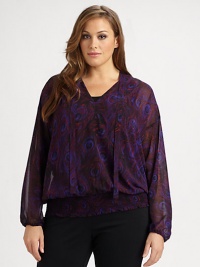 An exquisite print meets ethereal fabrication to create a breezy top with a feminine self-tie detail. Its smocked hem ensures this top offers a flattering and comfortable fit.Tie detail at v-neckDolman sleevesElasticized cuffsAllover printSmocked hemAbout 28 from shoulder to hemPolyesterMachine washImported