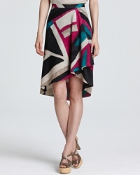 Infuse your style with graphic edge in this DKNYC skirt, a dramatic side ruffle lends vibrant movement to your every step. Infuse your style with graphic edge in this DKNYC skirt, a dramatic side ruffle lends vibrant movement to your every step.