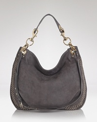 We're all about a bag that we can throw on with just about anything, and this Rebecca Minkoff hobo tops our list, crafted of luxe and luscious suede. We're all about a bag that we can throw on with just about anything, and this Rebecca Minkoff hobo tops our list, crafted of luxe and luscious suede.