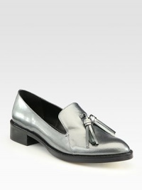Lustrous, metallic patent leather and playful tassels update this classic style. Stacked heel,1¼ (30mm)Patent leather upperLeather liningLeather solePadded insoleImported