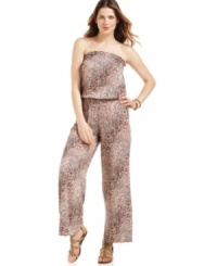 Take a walk on the wild side with Sunny Leigh's animal-print jumpsuit. A softly draped strapless silhouette and flowing wide legs define it as a trendy choice for your next night out. Take a walk on the wild side with Sunny Leigh's animal-print jumpsuit. A softly draped strapless silhouette and flowing wide legs define it as a trendy choice for your next night out.