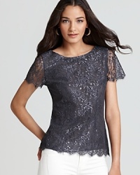 Velvet by Graham & Spencer's metallic lace top ensures a luxe statement. Scalloped trims and sheer sleeves make lend a sophisticated, lady-like finish. Velvet by Graham & Spencer's metallic lace top ensures a luxe statement. Scalloped trims and sheer sleeves make lend a sophisticated, lady-like finish.