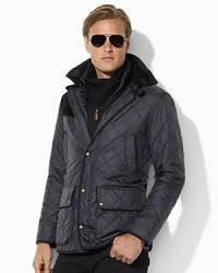 A rugged bomber jacket silhouette takes on a timeless hunting feel with a warm quilted body and corduroy accents. A rugged bomber jacket silhouette takes on a timeless hunting feel with a warm quilted body and corduroy accents.