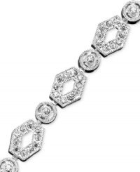 Old-world glamour for the modern woman. An elegant and ornate bracelet with gorgeous shimmer & crystal accents. Rhodium plated. Length measures 7 inches. Old-world glamour for the modern woman. An elegant and ornate bracelet with gorgeous shimmer & crystal accents. Rhodium plated. Length measures 7 inches.