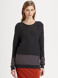 Lengthy, featherweight sweater of merino wool has pleated shoulders and glistening silk panels. RoundneckPleated shouldersLong sleeves with silk panelsSilk panel at hipsLonger length hits below the hipsBody: Merino wool; Contrast: SilkDry cleanImportedModel shown is 5'10 (177cm) wearing US size Small. Lengthy, featherweight sweater of merino wool has pleated shoulders and glistening silk panels. RoundneckPleated shouldersLong sleeves with silk panelsSilk panel at hipsLonger length hits below the hipsBody: Merino wool; Contrast: SilkDry cleanImportedModel shown is 5'10 (177cm) wearing US size Small.