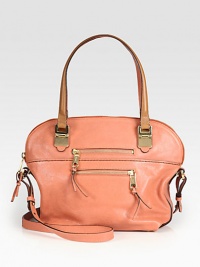 A shapely silhouette of soft lambskin leather with goldtone zipper details and lady-like elongated top handles. Double top handles, 7¾ dropAdjustable shoulder strap, 17½-19 dropDouble top zip closureTwo outside zip pocketsProtective leather feetTwo inside open pocketsCotton lining14¾W X 10H X 5½DMade in Italy A shapely silhouette of soft lambskin leather with goldtone zipper details and lady-like elongated top handles. Double top handles, 7¾ dropAdjustable shoulder strap, 17½-19 dropDouble top zip closureTwo outside zip pocketsProtective leather feetTwo inside open pocketsCotton lining14¾W X 10H X 5½DMade in Italy