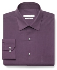 Step out in solid style with this handsome dress shirt from Geoffrey Beene.