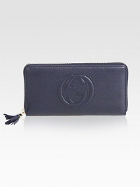 Soho leather zip-around wallet with inner pocketsLeatherLight fine gold hardwareZip-around closureEmbossed interlocking GTwelve card slots Three bill compartmentsZip coin pocket7.5W x 4.2H x .9DMade in Italy Soho leather zip-around wallet with inner pocketsLeatherLight fine gold hardwareZip-around closureEmbossed interlocking GTwelve card slots Three bill compartmentsZip coin pocket7.5W x 4.2H x .9DMade in Italy