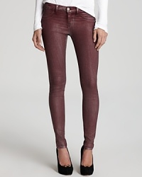 Metallic-coated J Brand skinny jeans strut into the new season with trendsetting shine in a casual low-rise silhouette. Metallic-coated J Brand skinny jeans strut into the new season with trendsetting shine in a casual low-rise silhouette.