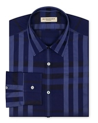 Inky blue hues lend a moody and mysterious air to a check-printed dress shirt from Burberry London. Inky blue hues lend a moody and mysterious air to a check-printed dress shirt from Burberry London.
