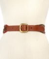 Take an artisan approach to accessorizing with this have-to-have hippie-chic belt from Fossil. Featuring rich woven leather, stud accents and a brass-tone buckle, it's the finishing touch to a laid-back look.